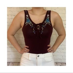 American Eagle burgundy bodysuit with floral embroidery